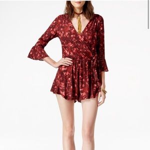 Free People long sleeve floral romper